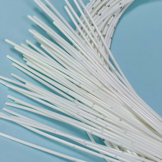 Custom-made Medical Disposable White TPU Plastic Perforated and Printed End Caps from China